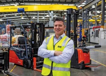 SEW-EURODRIVE’s national procurement manager, Fred Pizzicara, with Toyota material handling equipment at the company’s Australian facility. Images: TMHA