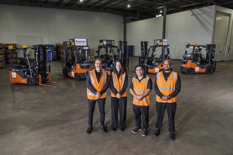 The Premier Fresh team alongside its updated national forklift fleet, supporting operations across multiple Australian states. Image: TMHA